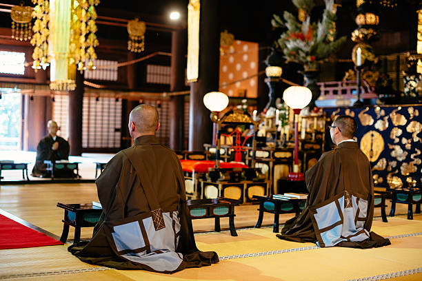 istock Monks during prayer in Buddhist shrine in Kyoto 539084258