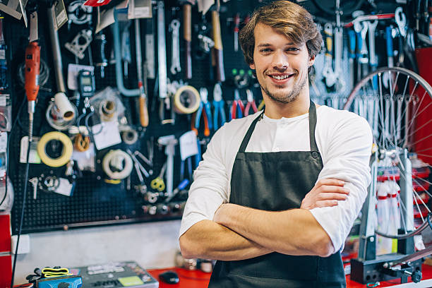 istock Mechanic in front of a tool board 539084368
