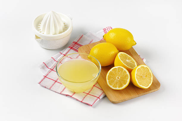 istock lemon juice and fresh lemons 539085086