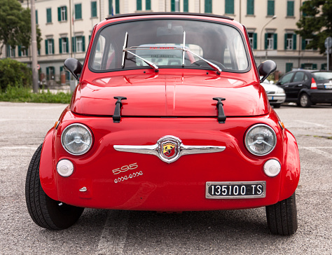 Gorizia, Italy - June 5, 2016: Red Fiat 500 Abarth 595 front view, parked and exhibited at the old timer car meeting Antiche Scuderie Isontine in the town of Gorizia in Italy