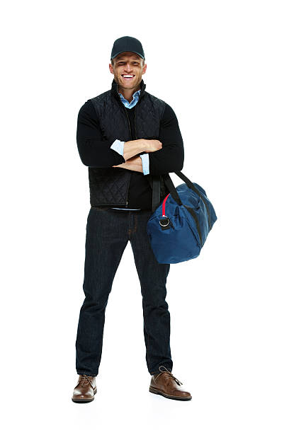 istock Smiling man holding gym bag 539090884