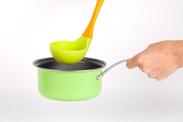 istock Colorful ladle with pot or pan 539094220