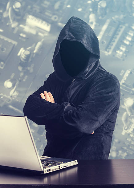 Hacker at work stock photo