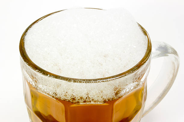 Mug of beer on white background