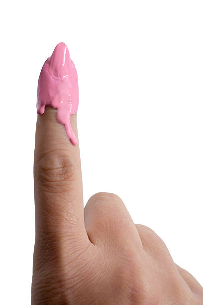 istock Woman pointing up with dripping sundae nails 539101656
