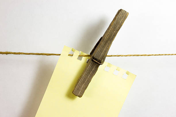 istock Blank sheet paper on wooden clothespin 539103438