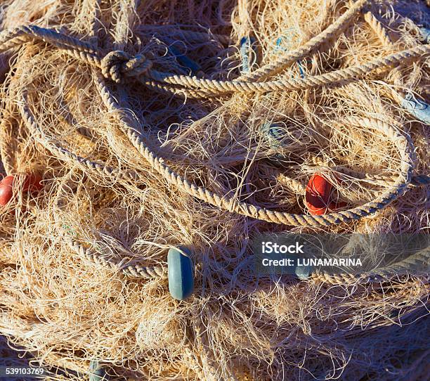 Fishing Trammel Net Tackle Texture In Gandia Port Stock Photo - Download Image Now - Brown, Business, Business Finance and Industry