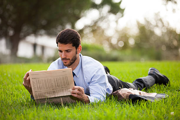 istock Businessman reading the newspaper 539104377