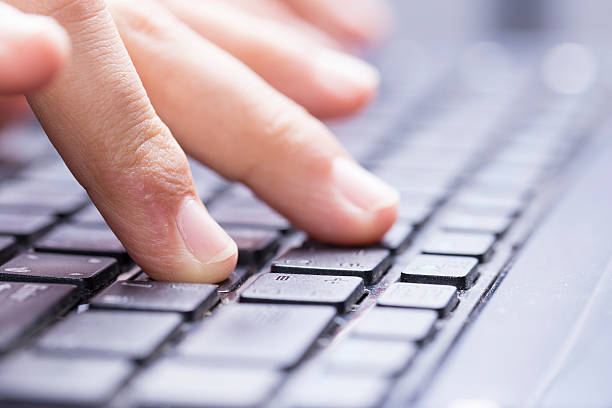 istock Closeup of hand on keyboard 539105250