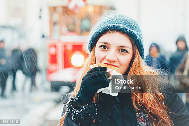 Young Woman Eating Turkish Wet Burger At Beyoglu Istanbul Stock Photo - Download Image Now