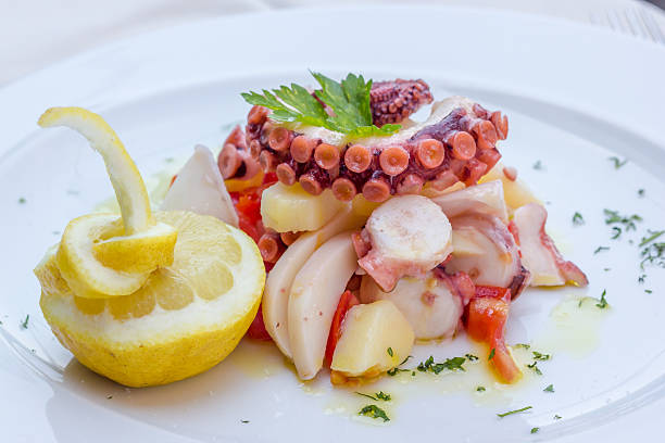 istock Appetizer of cuttlefish octopus and potatoes 539109076