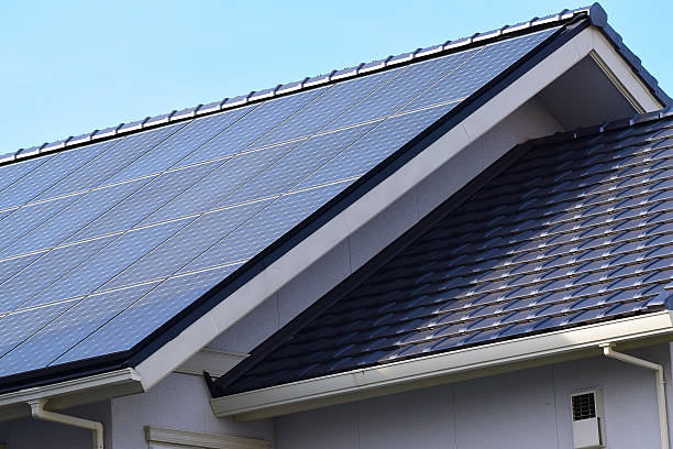 istock Renewable Green Energy Solar Panels on House Roof 539109558