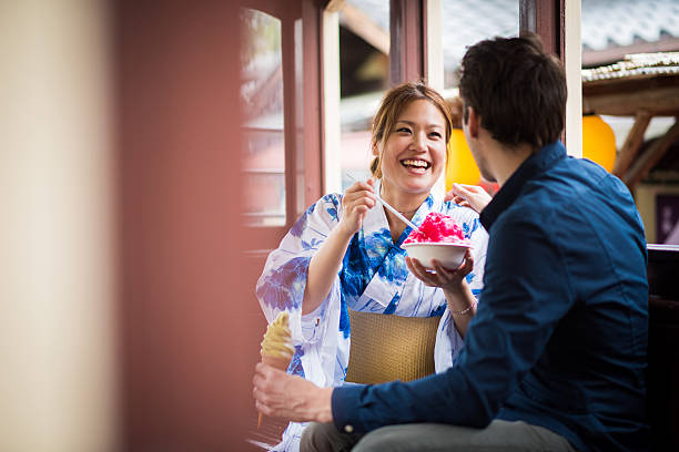 日本の女性の伝統的な服装の日 - women eating ice cream indigenous culture ストックフォトと画像