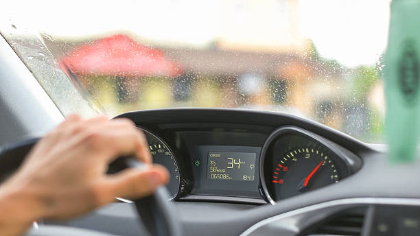 istock Man Driving a Car Through the Village 539109692