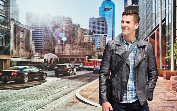 istock Smiling casual man standing at street 539110730