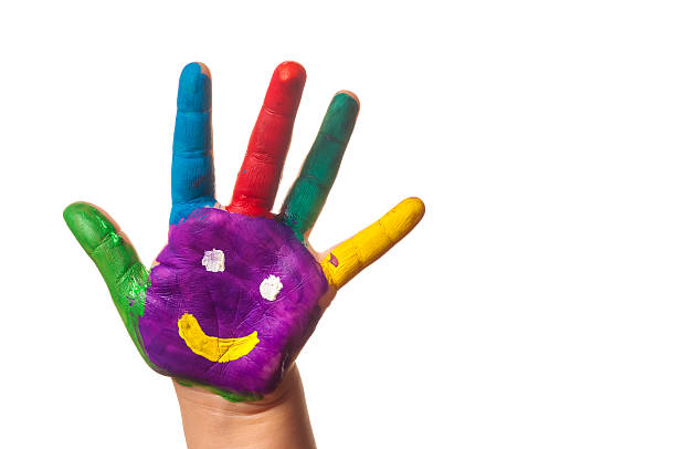 istock Child's hand painted watercolor against white background 539112256