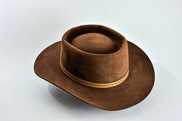 istock Vintage brown cowboy hat on white background. 539112400