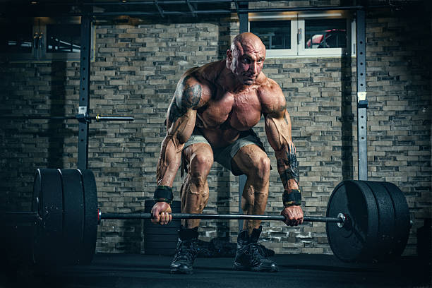 Weight Lifting, Dead Lift Muscular Men Lifting Heavy Weights, Dead Lift  clean and jerk stock pictures, royalty-free photos & images