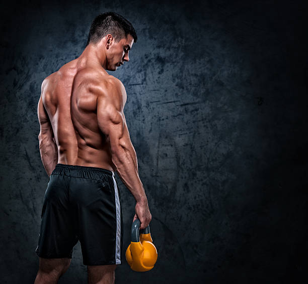стоя сильных - men body building human muscle muscular build стоковые фото и изображения