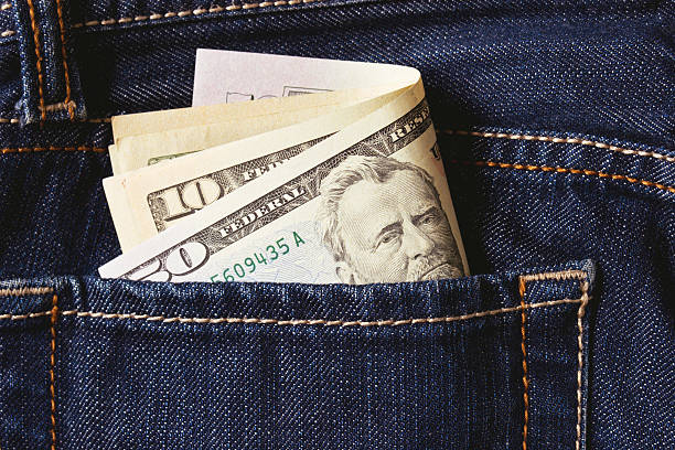 istock Money in jeans pocket 539116262