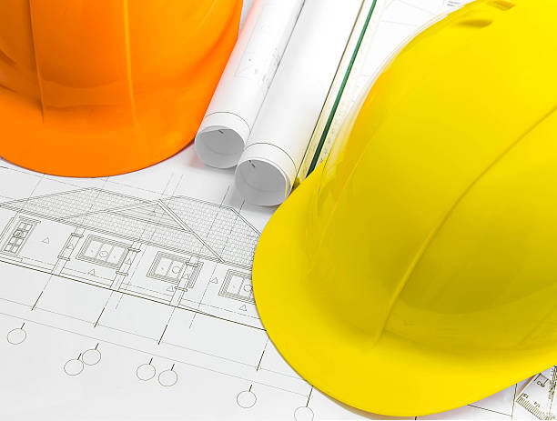 istock Architectural blueprint of office building with a pencils 539118785
