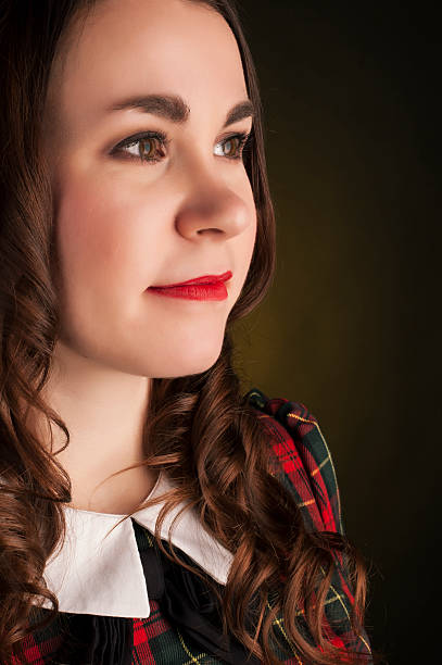 carino brunette in abito tartan con labbra rosse e curles. - child portrait fine art portrait multi colored foto e immagini stock