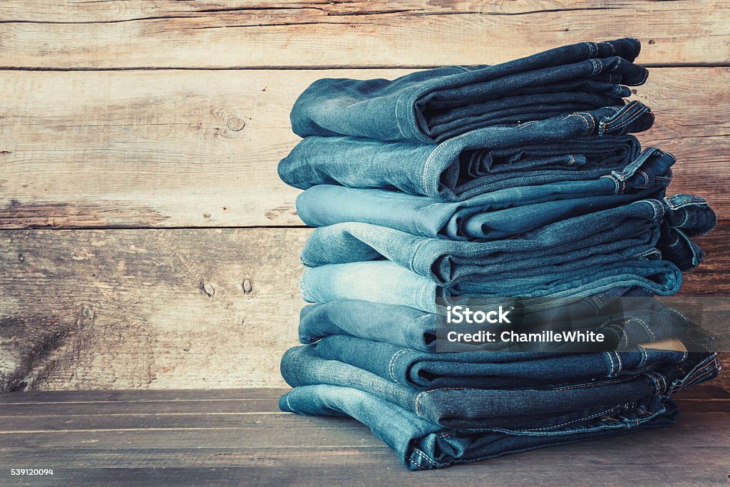 Stacked fashion blue jeans Stacked fashion blue jeans in store Jeans Stock Photo