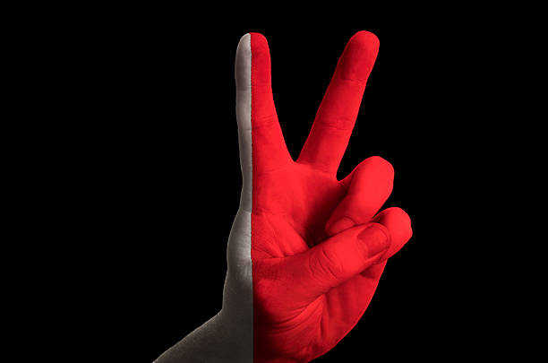 istock bahrain national flag two finger up gesture for victory 539120123