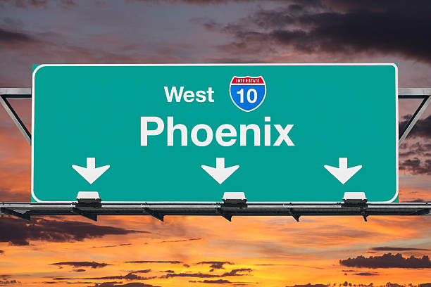 istock Phoenix Arizona Interstate 10 West Highway Sign with Sunrise 539121142