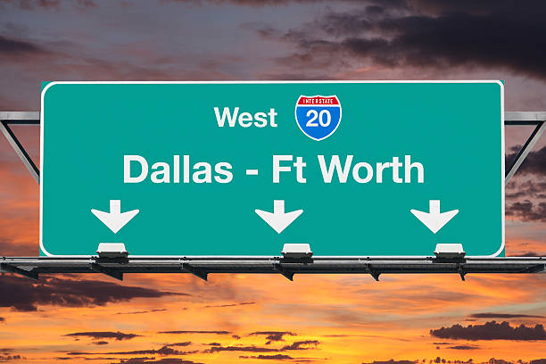 istock Dallas Ft Worth Interstate 20 West Highway Sign with Sunrise 539124292