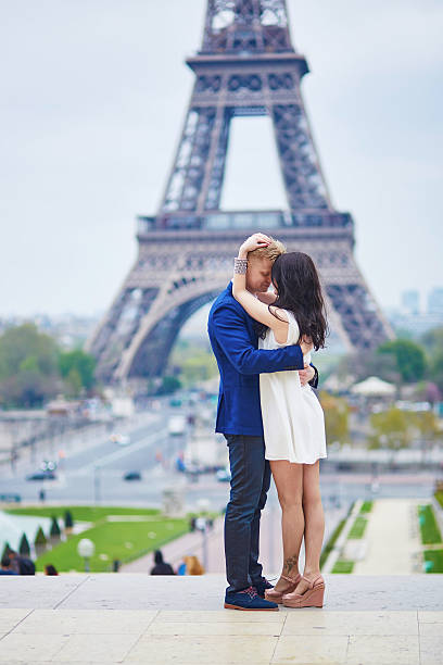 istock Romantic couple in Paris near the Eiffel tower 539124456