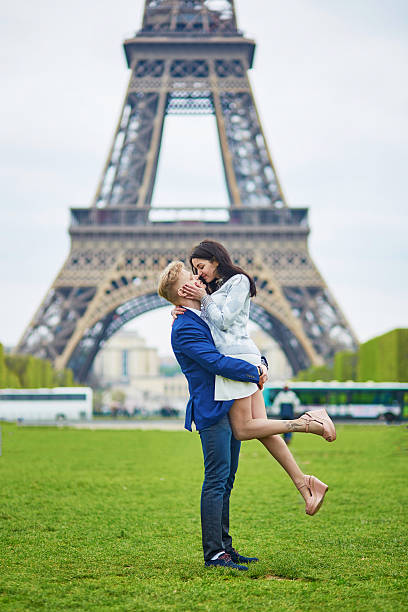 istock Romantic couple in Paris near the Eiffel tower 539125068