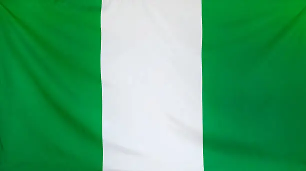 Photo of Nigeria Flag real fabric seamless close up