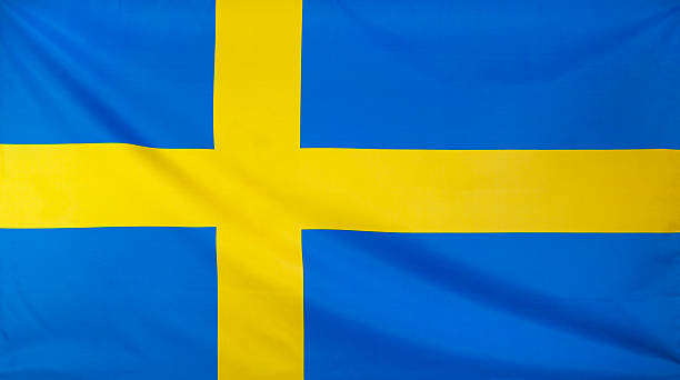 istock Sweden Flag real fabric seamless close up 539127096
