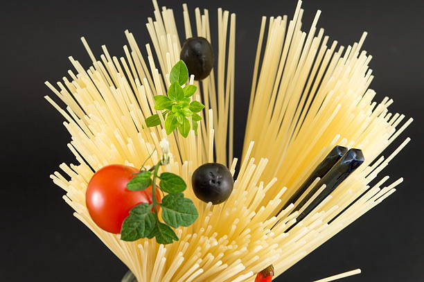 Raw spaghetti in spiral shape ready for cooking