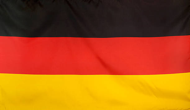 istock Germany Flag real fabric seamless close up 539127524