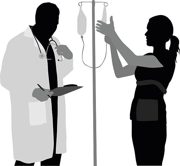 Nurse's Night Shift A vector silhouette illustration of a doctor and nurse working.  The doctor looks over a clipboard wearing a labcoat and stethoscope.  A female nurse works an IV unit on a pole wearing her scrubs. nurse silhouettes stock illustrations