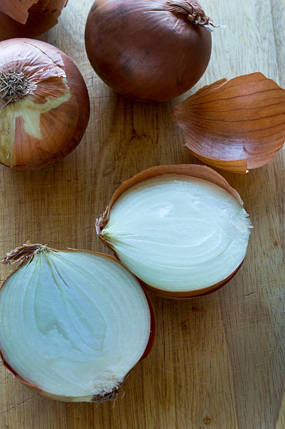 istock Onion cut in half with other onions in background 539138161