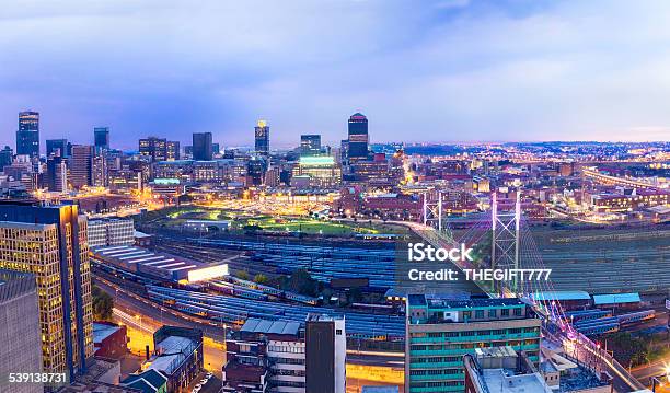 Nelson Mandela Bridge In The Evening With Johannesburg Stock Photo - Download Image Now