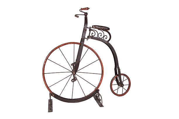 istock Historical high-wheel bicycle on a white background 539139059