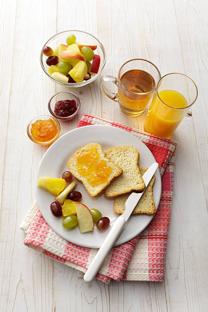istock Breakfast: Toast, Fruit Salad, Orange Juice and Tea 539148999
