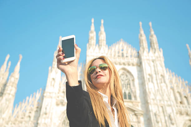istock Woman Taking Selfie - Duomo, Milan, Italy 539149741