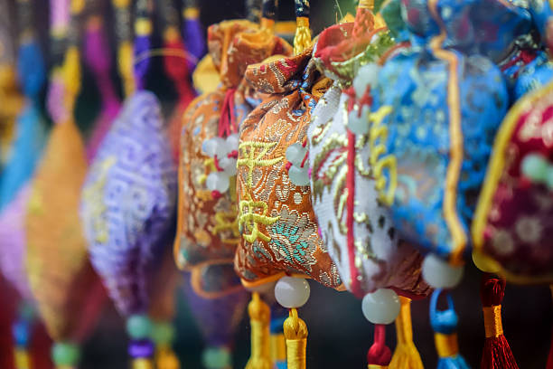 Chinese New Year Decoration bags or  ang pow hanging in a shop window.