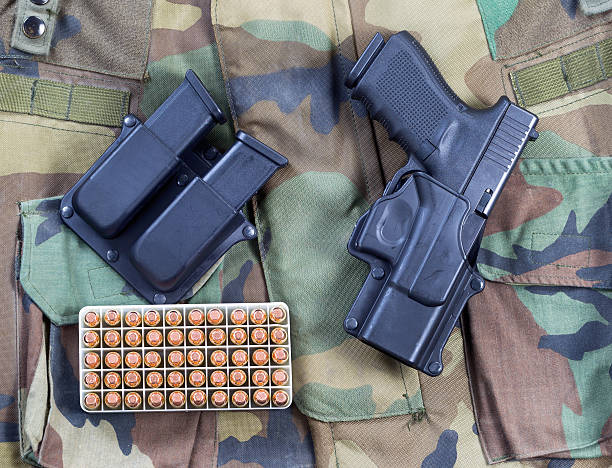 istock Military weapon and bullets with Uniform 539151749