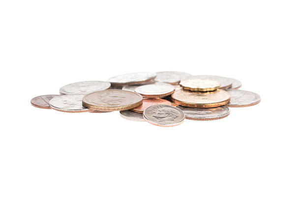 istock Pile of US coins isolated on white background 539165759