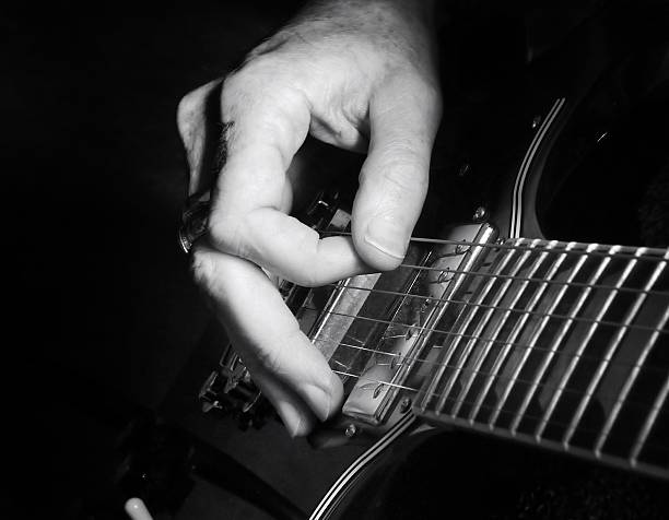 istock Strumming a guitar late at night. 539165901