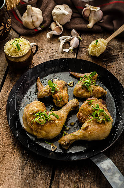 istock Bio roast chicken with herbs and garlic, couscous 539166835