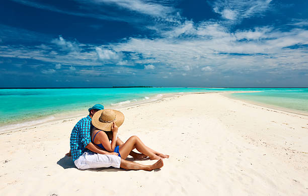 istock Couple in blue on a beach at Maldives 539167061