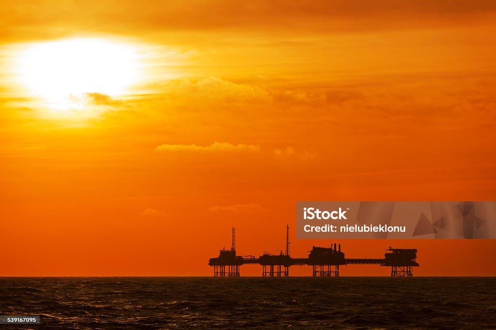 Oil platform on the North sea at sunset [url=http://www.istockphoto.com/search/lightbox/18181579]
[IMG]http://s1.zrzut.pl/Ag1lkAv.jpg[/IMG]
[/url] 2015 Stock Photo