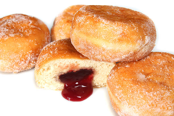 istock Image of fresh jam doughnuts / jelly donuts, with caster sugar 539167609